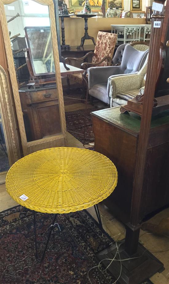 Wicker top circular table and a standard lamp